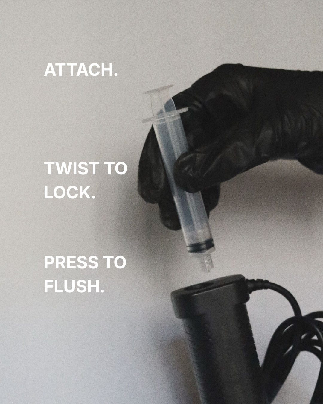 IntuBlade lens-clearing attachment being connected to the video laryngoscope